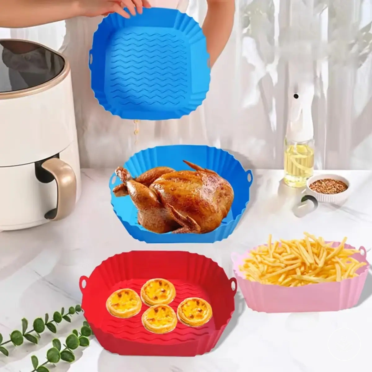 Square silicone air fryer pot tray for baking and basket lining.