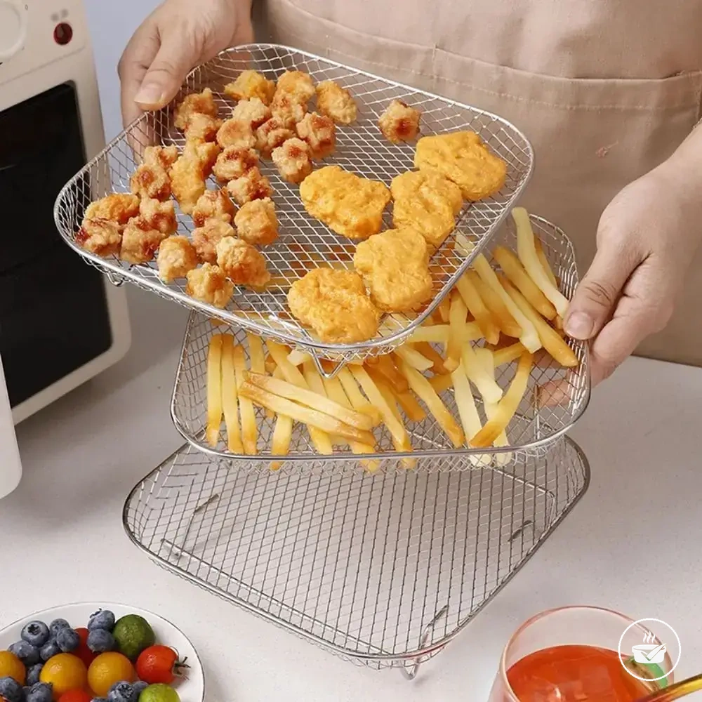 Stackable stainless steel air fryer rack with a non-stick tray surface.