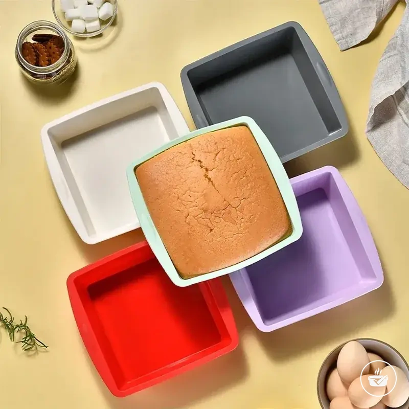 Molde cuadrado de silicona para brownie con asas antideslizantes, apto para horno y freidora de aire.
